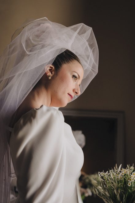 Photograph of the bride posing looking at infinity.